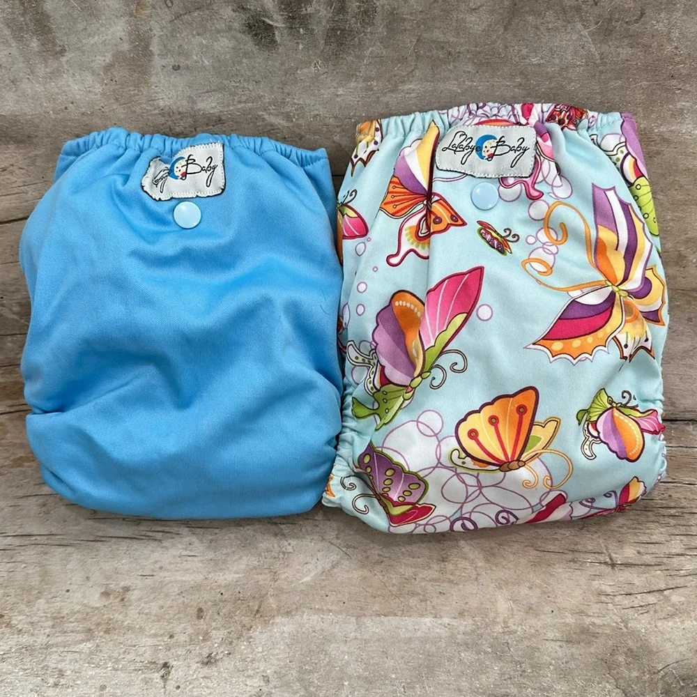 Lalabye Baby, one size cloth diapers reusable. Pair, one print one solid. *USED*